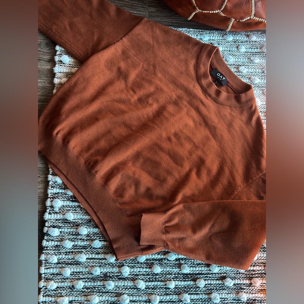 Burnt orange sweater